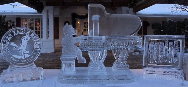 Long elegant ice bar structure with decorative pillars setup inside a venue