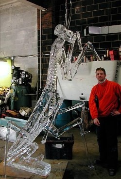 Large architectural custom ice sculpture display inside a banquet hall