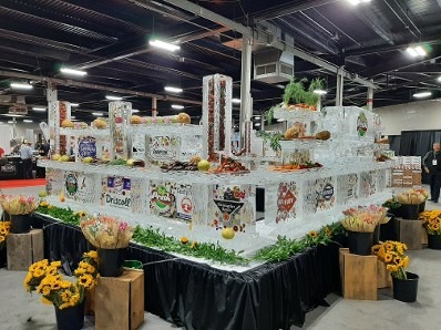 Elaborate catered corporate banquet buffet counter with large ice displays