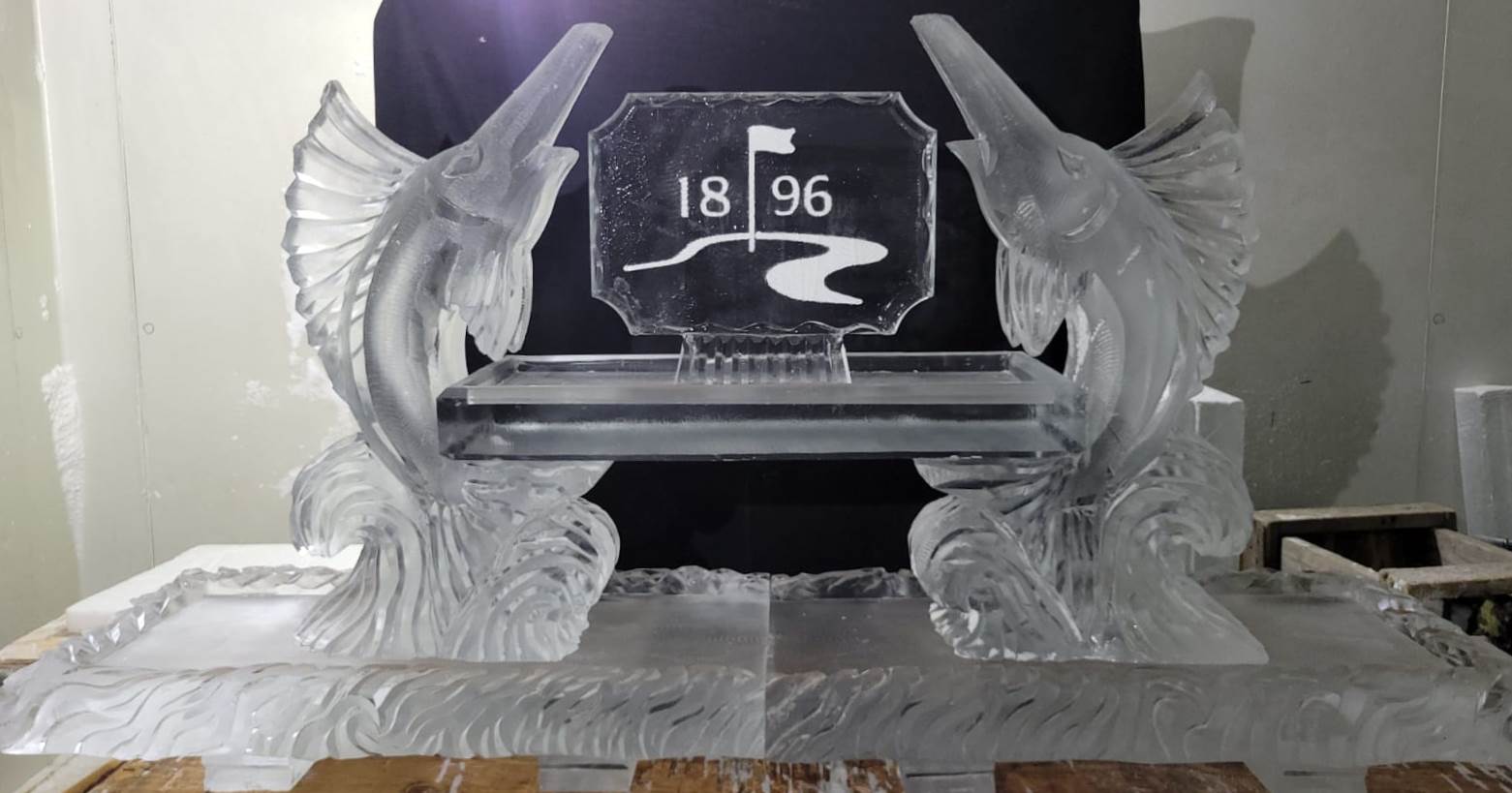 1896 commemorative ice sculpture with wings