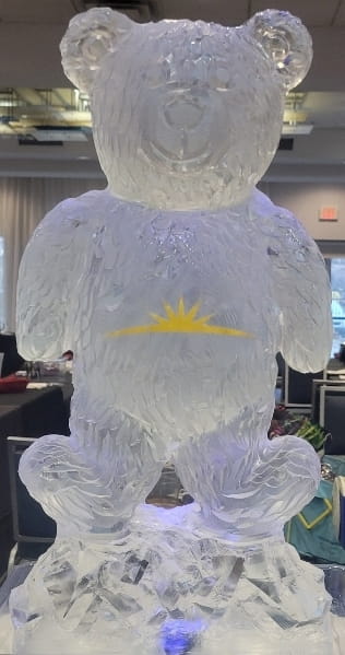 Teddy bear ice sculpture with sun engraving