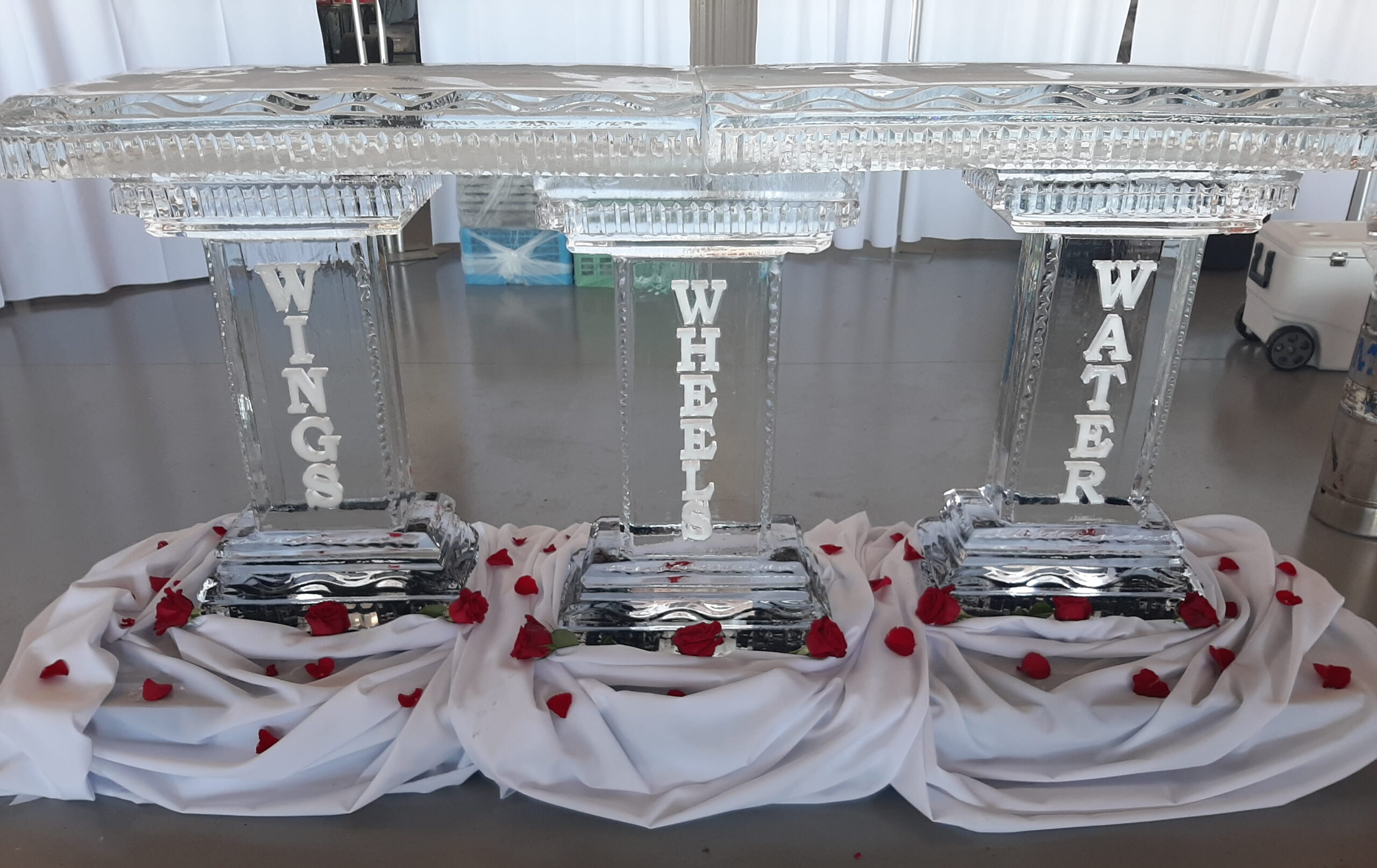 Wedding ice bar with monogrammed ice panels