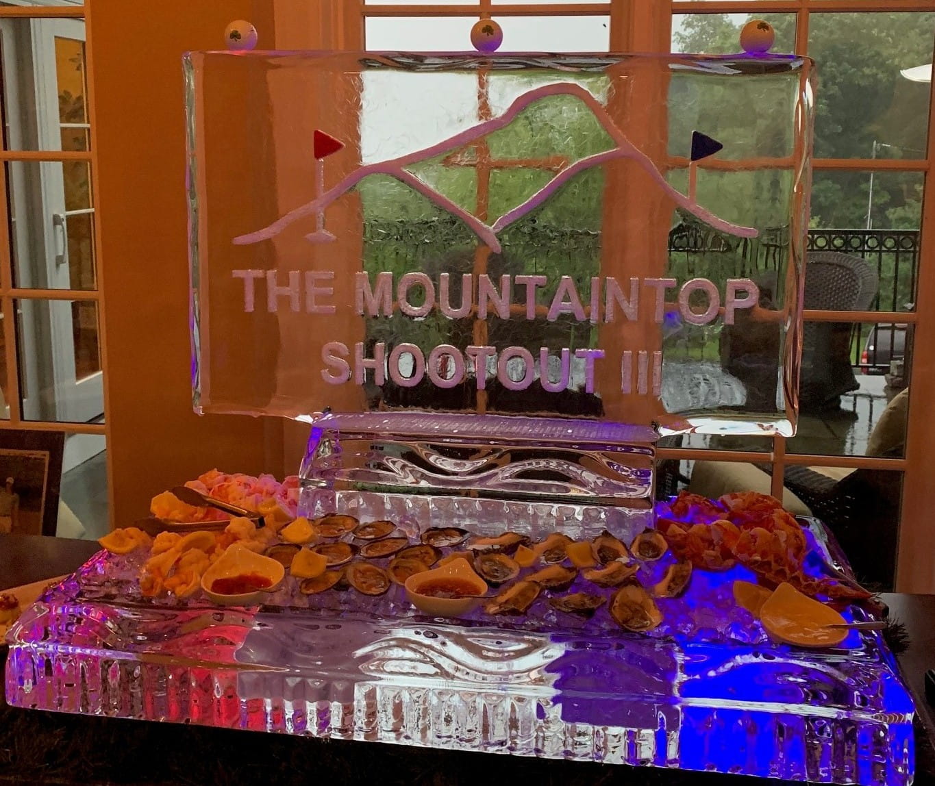 Mountain Top Shootout engraved ice sculpture