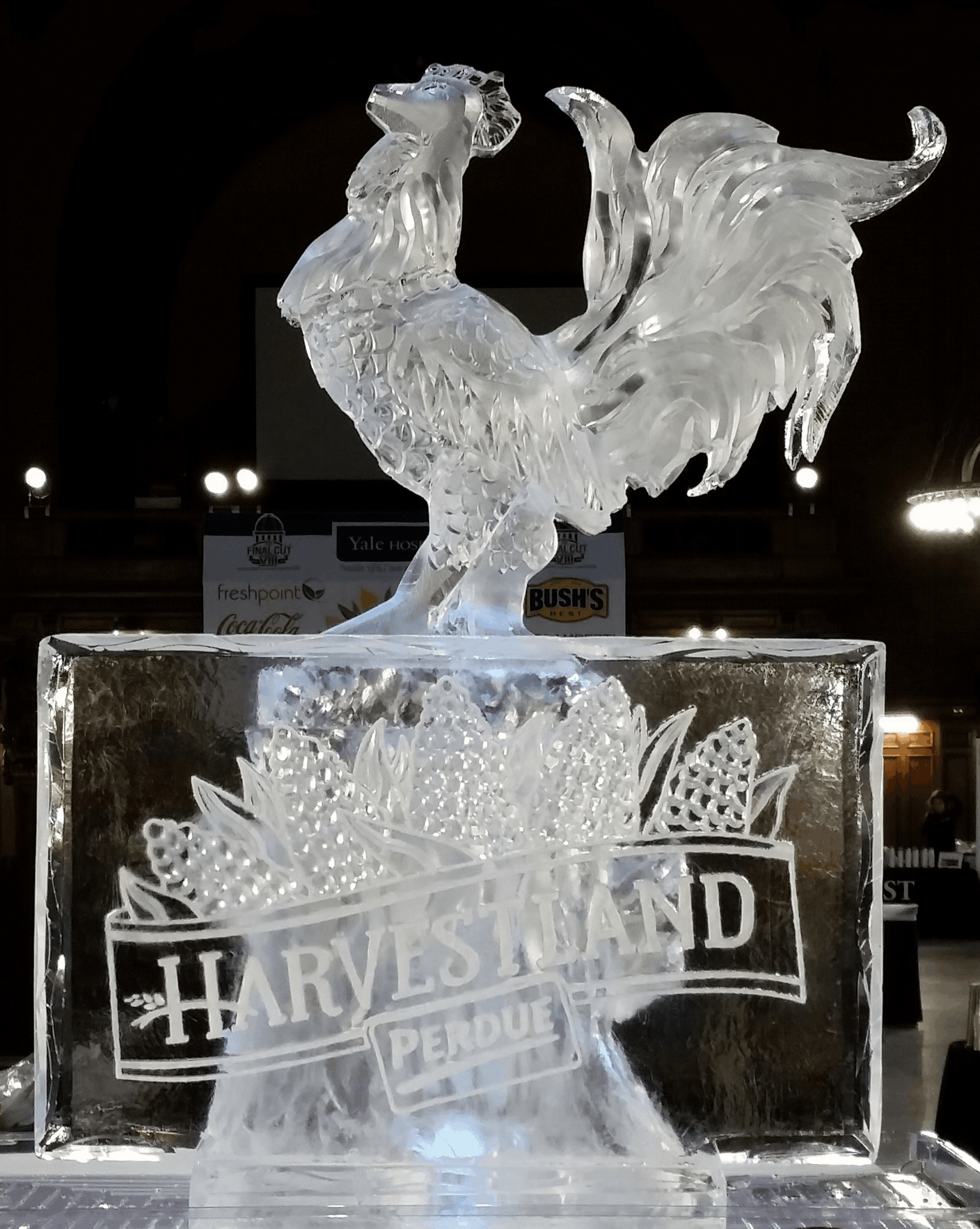 Detailed proud rooster ice sculpture carving for a culinary display
