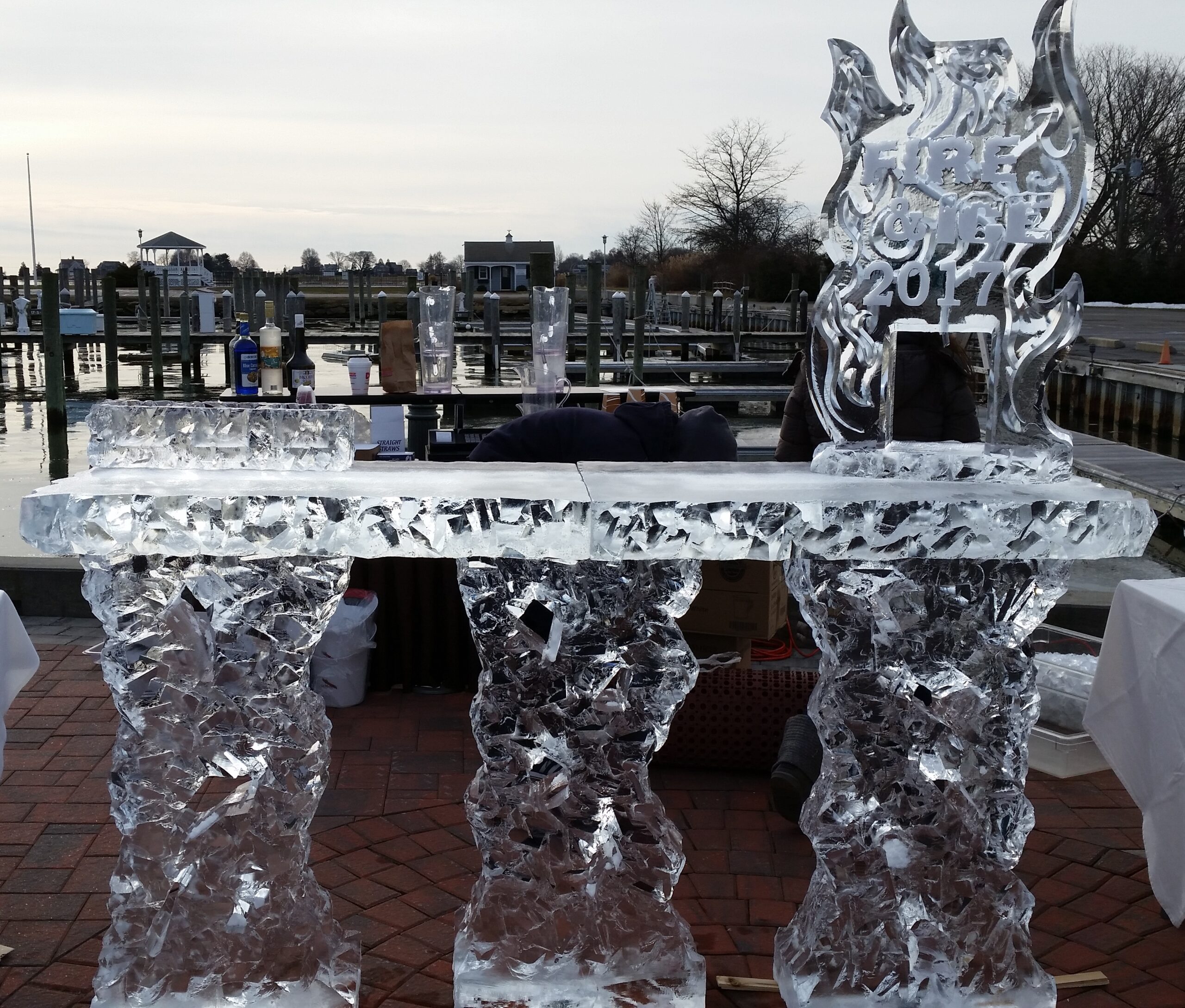 Outdoor wedding ice sculpture with horse carving