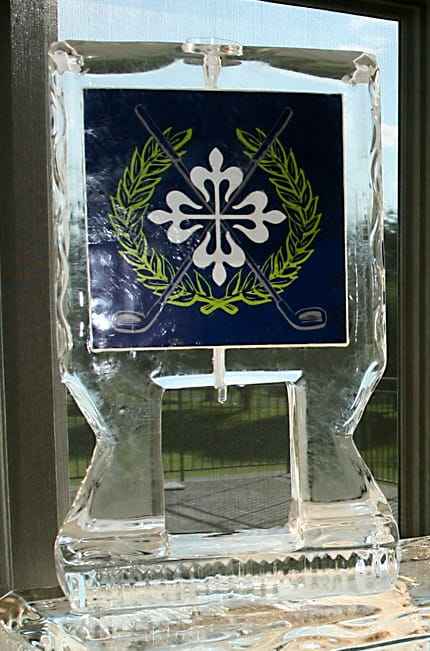Holiday wreath engraved ice sculpture