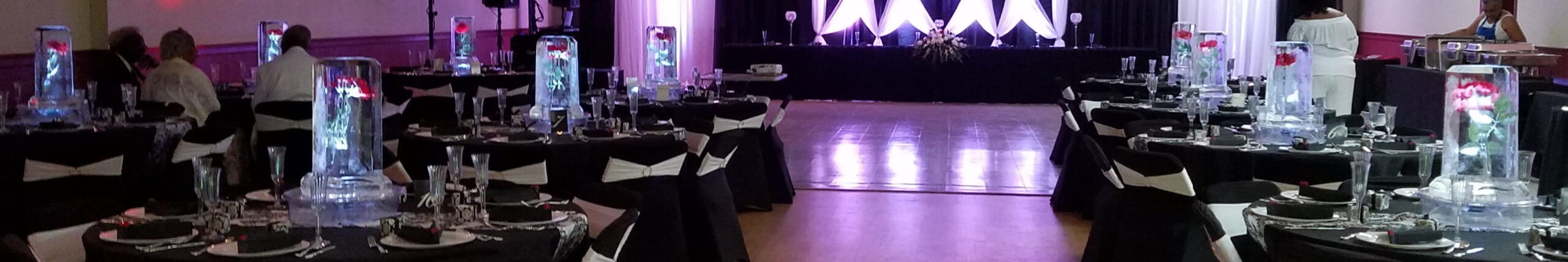 Event ballroom featuring illuminated ice sculptures