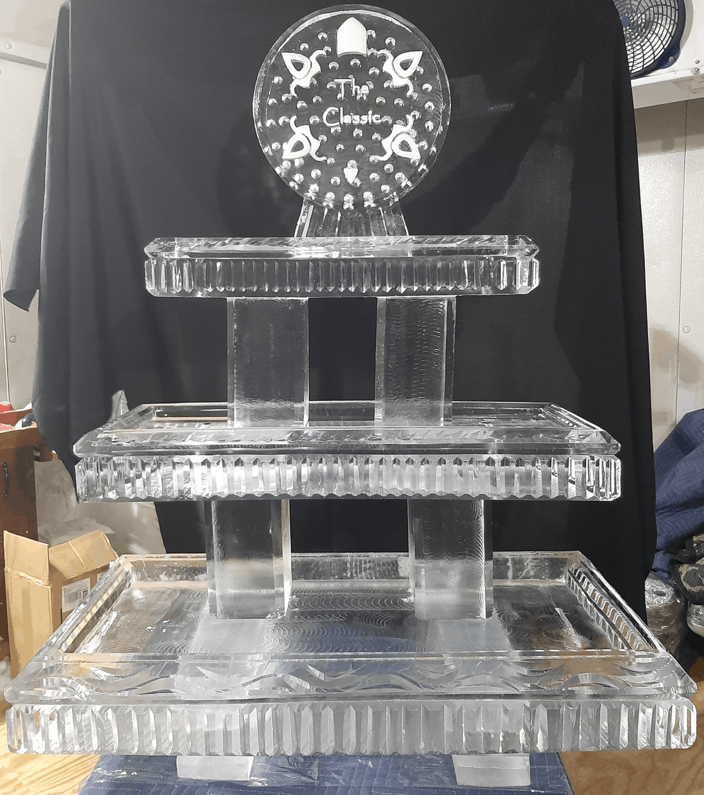 Three-tier ice display stand for catering events