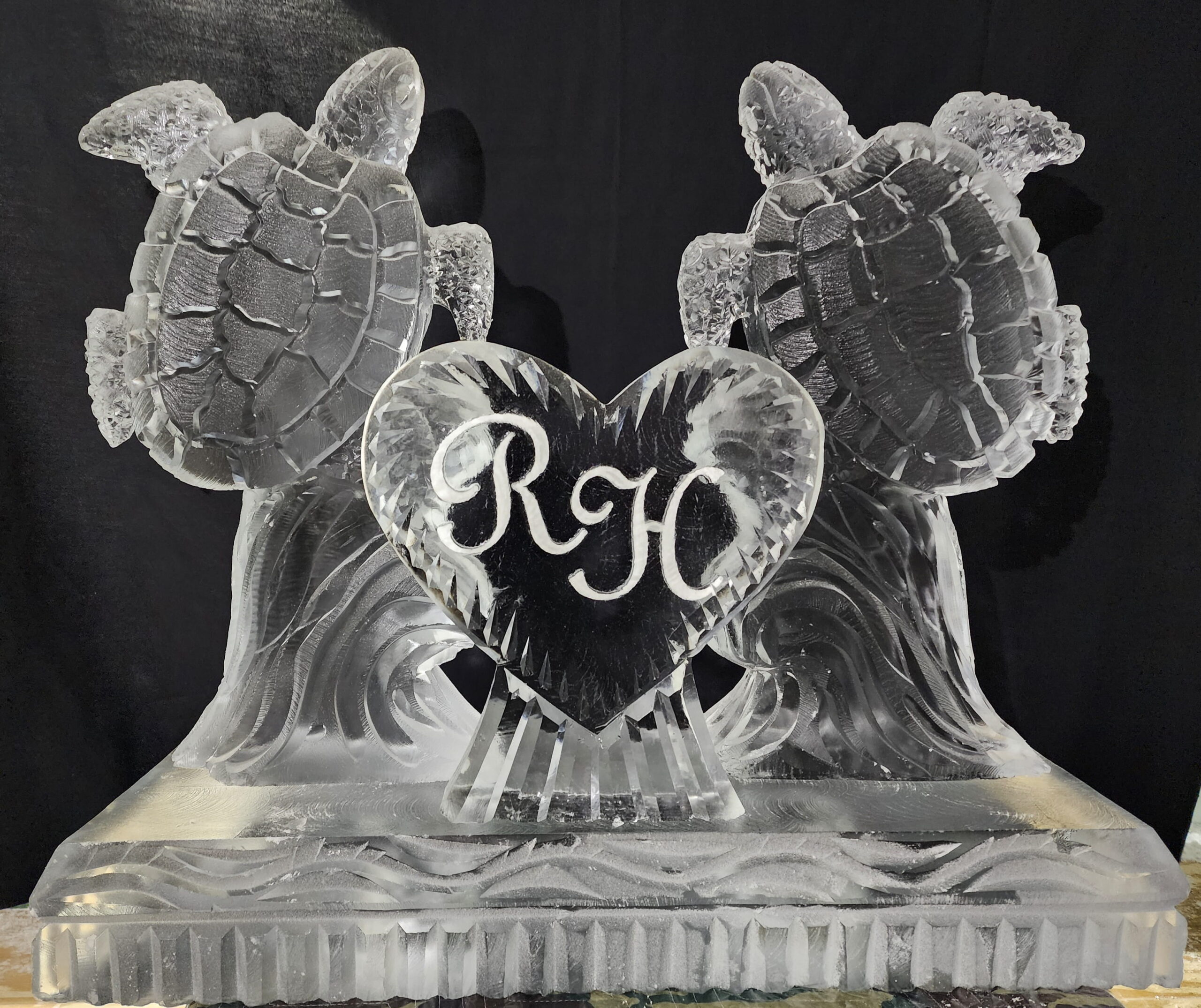 Wedding monogram ice sculpture with intertwined initials