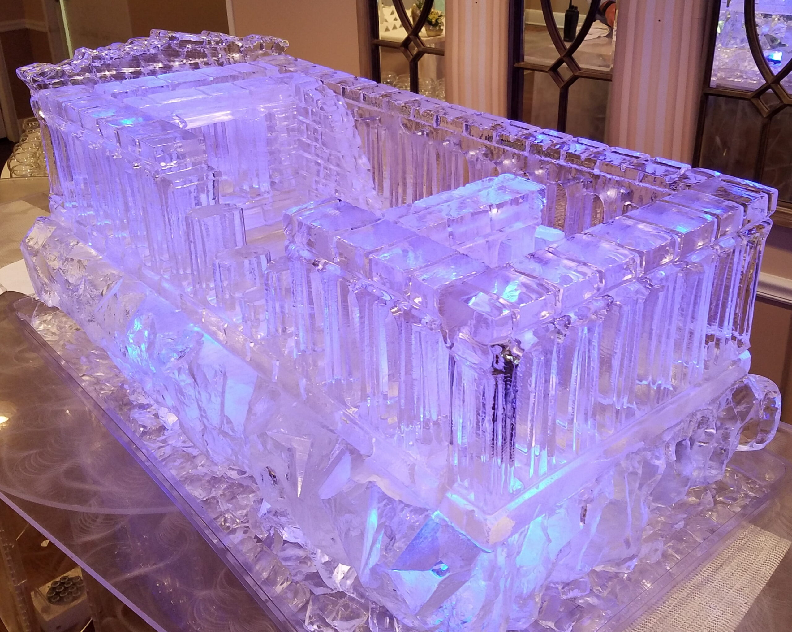 Illuminated ice bar with purple LED lighting