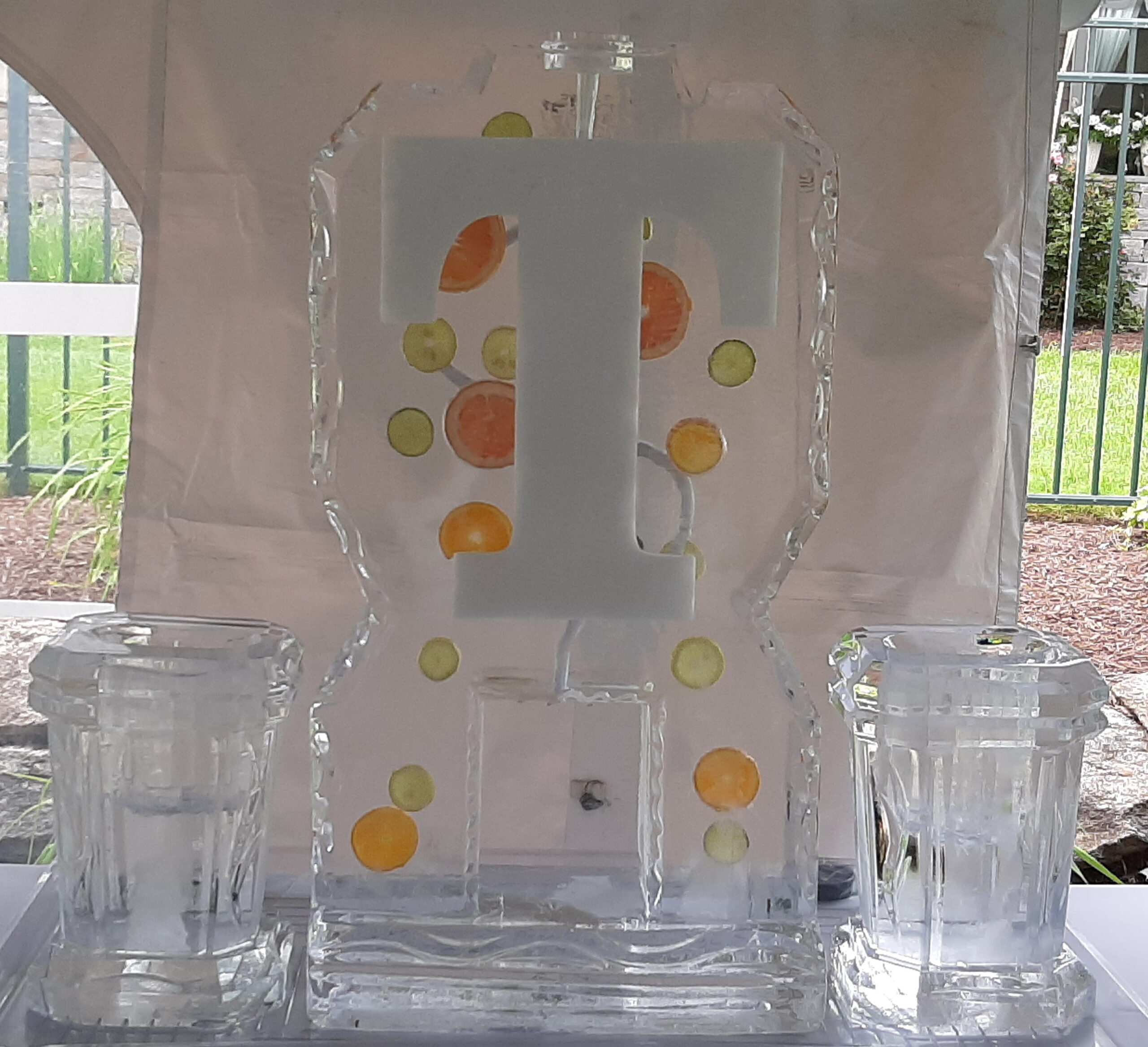 Custom monogram ice sculpture featuring letter T
