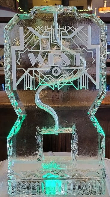 Custom monogram ice sculpture featuring intertwined initials