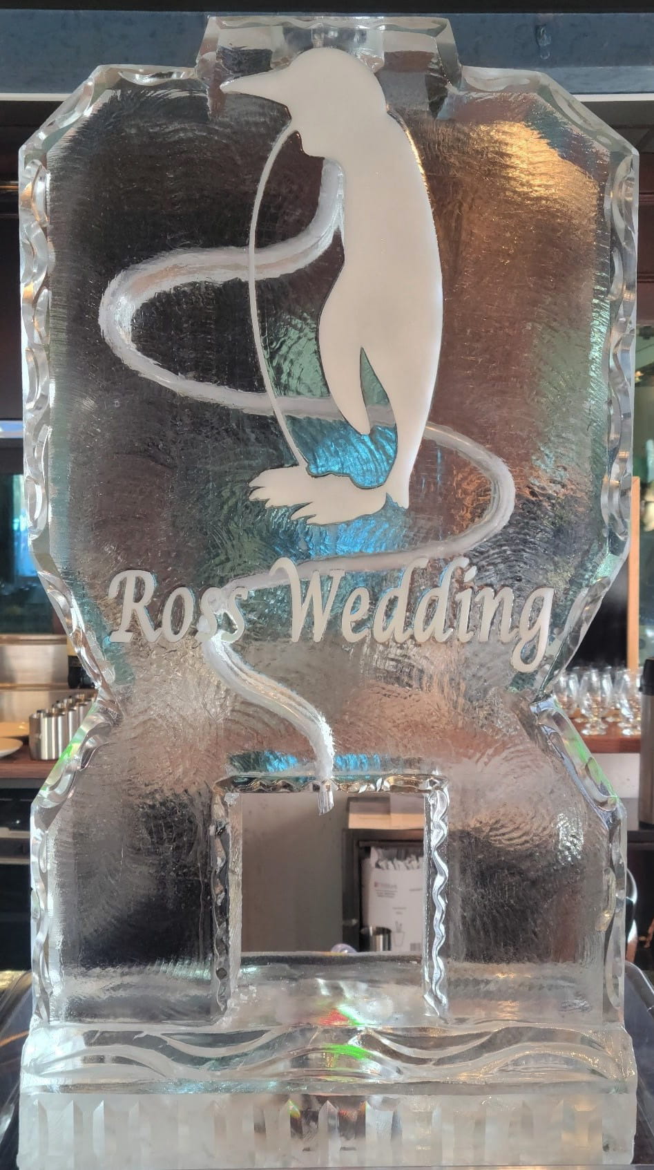 Wedding ice sculpture with engraved rose and wedding design