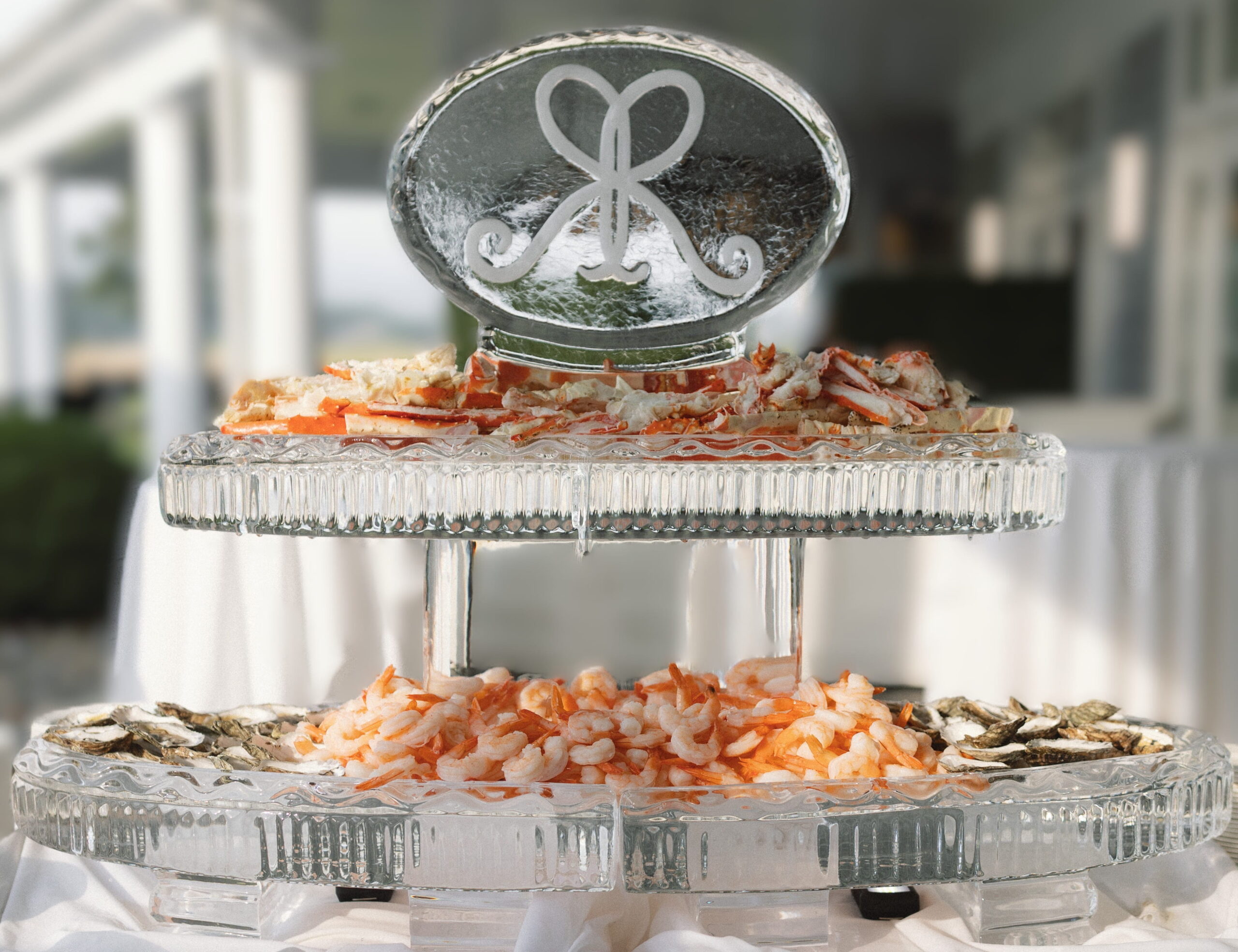 Custom monogram ice sculpture with decorative wedding initials
