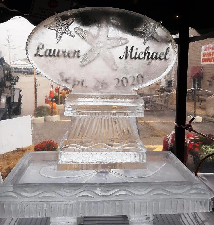 Wedding ice sculpture featuring bride and groom names Lauren & Michael