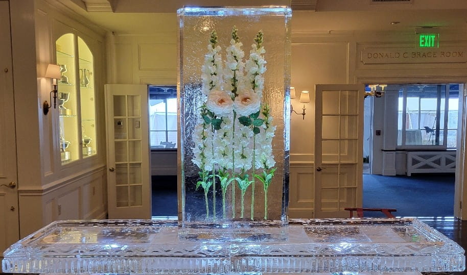 Elegant floral ice column centerpiece