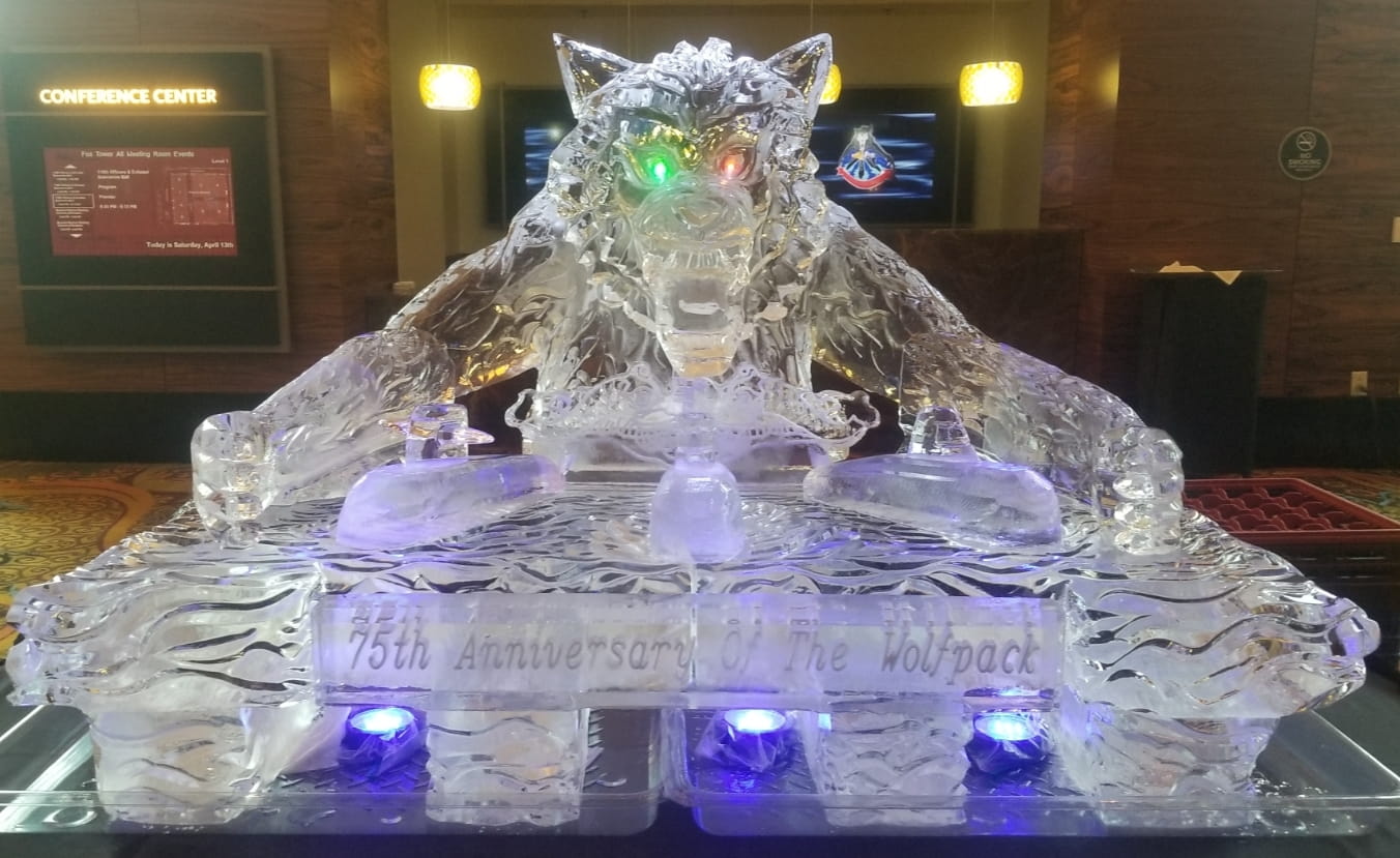 Illuminated lion head ice sculpture