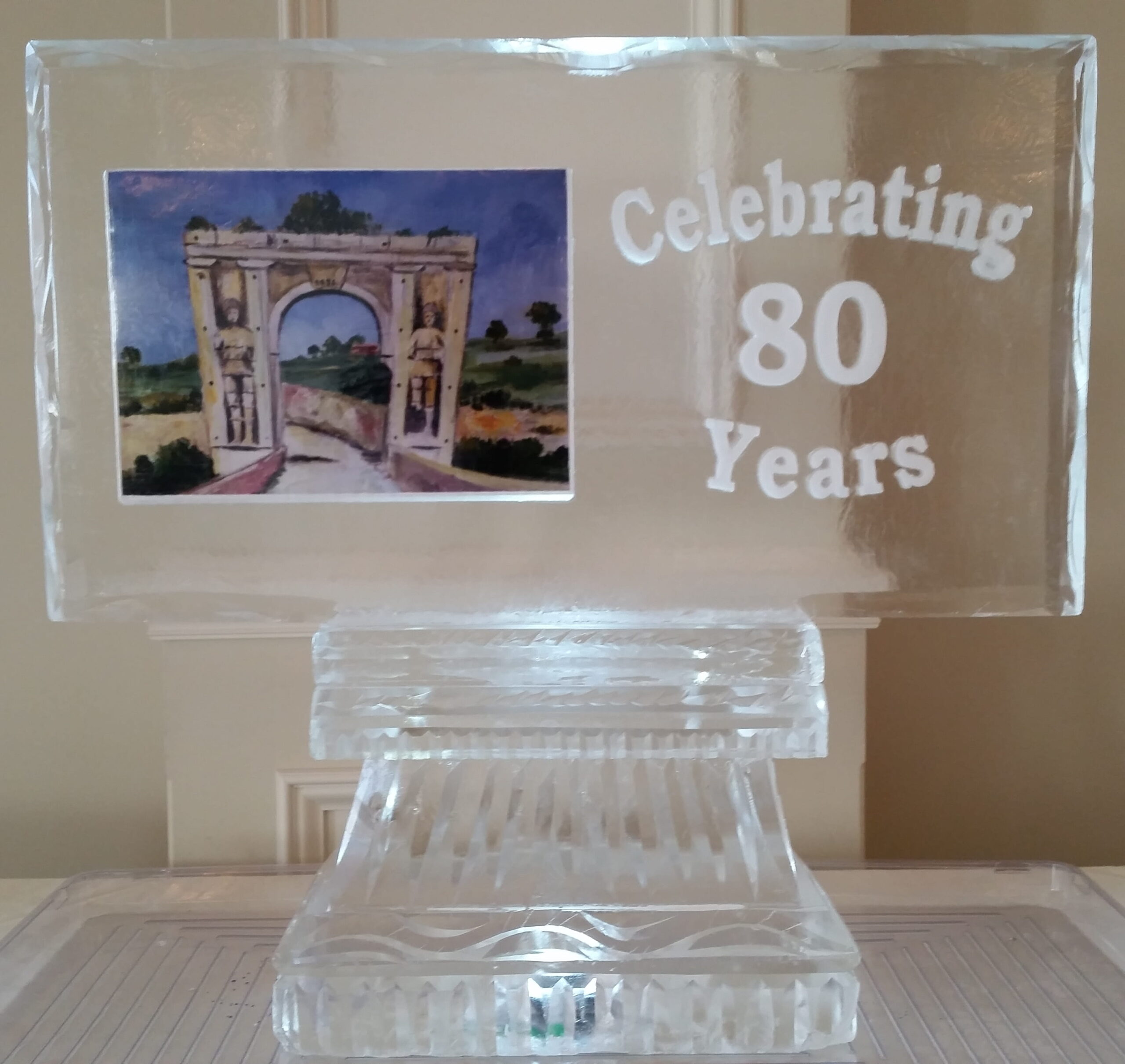 80th anniversary airplane-themed ice sculpture