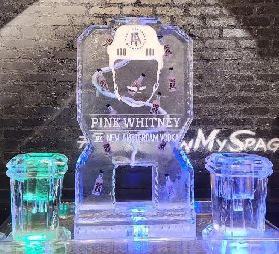 Pink Whitney branded bottle ice sculpture
