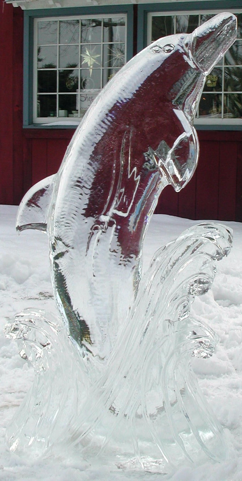Dolphin ice sculpture with curved design