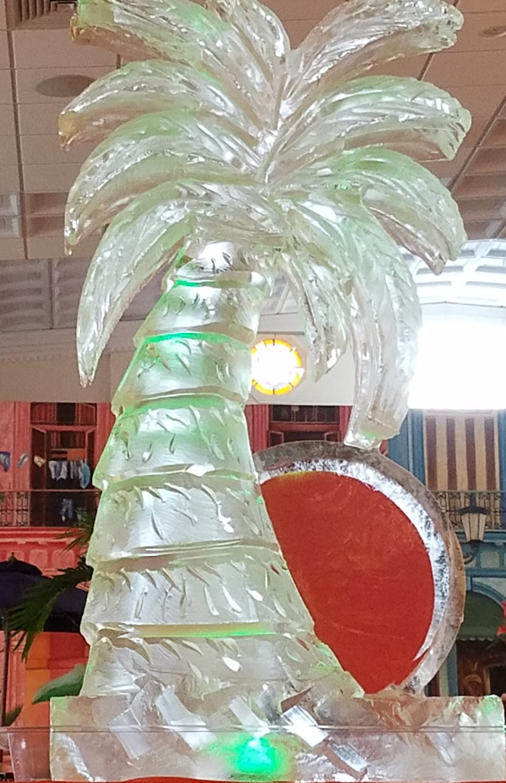 Palm tree ice sculpture with green lighting