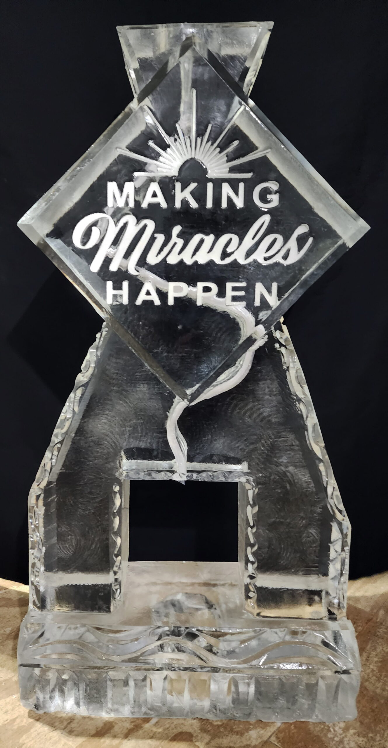 Making Miracles Happen engraved ice sculpture