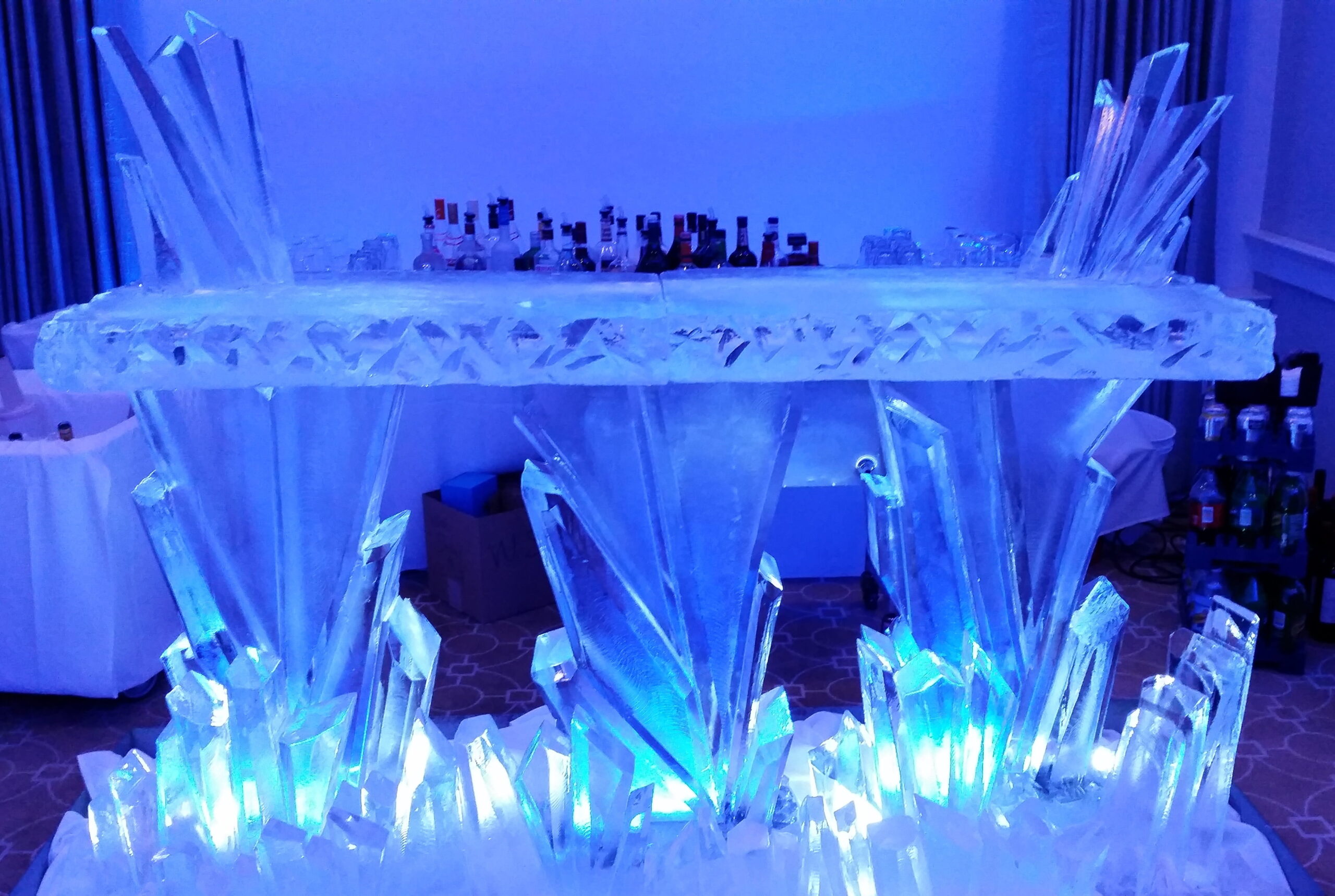 Blue illuminated ice bar for special event