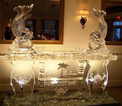 Luxury illuminated ice bar with decorative sculptures