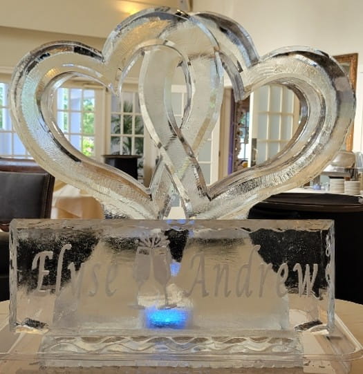 Detailed double hearts wedding ice sculpture on display