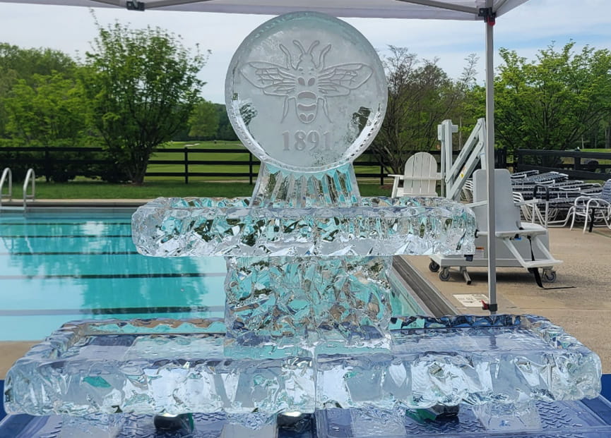 Round monogram ice sculpture centerpiece