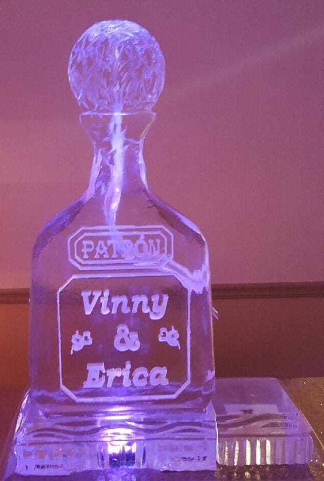 Personalized bottle-shaped ice sculpture with name engraving