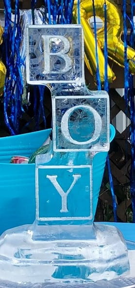 Modern geometric ice sculpture with blue lighting