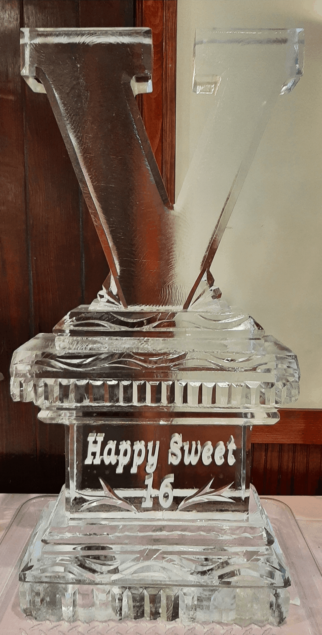 Elegant trophy-style ice sculpture centerpiece