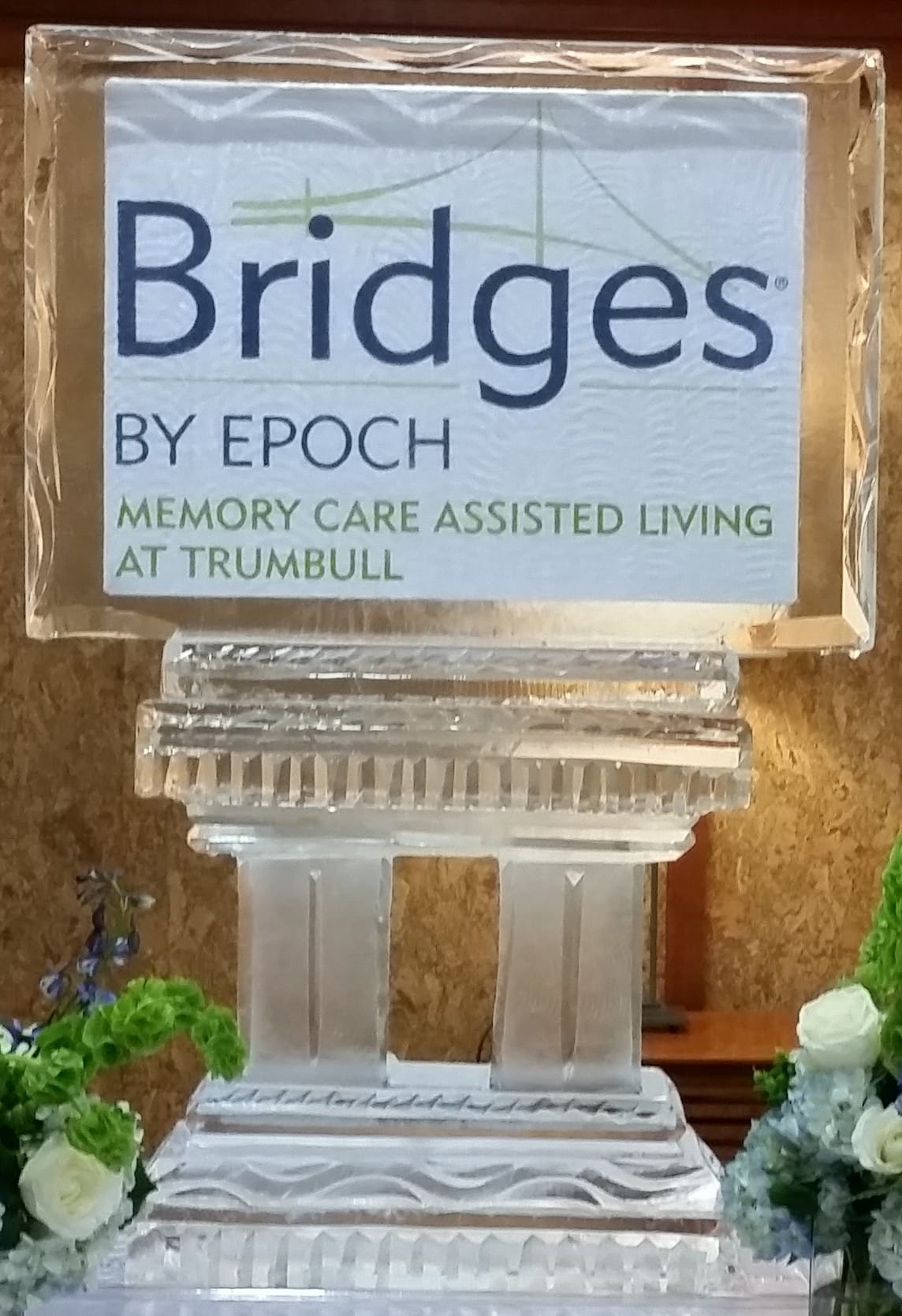Bridges by Epoch memory care community corporate logo ice display