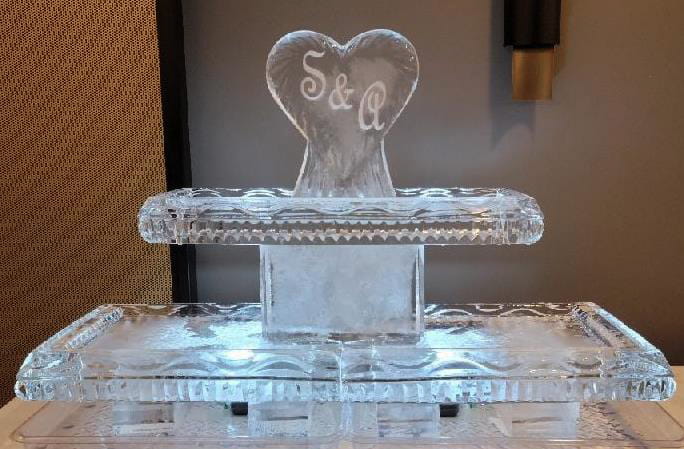 Heart monogram wedding ice sculpture for S & J