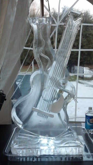 Elegant ice sculpture with flowing ribbon design
