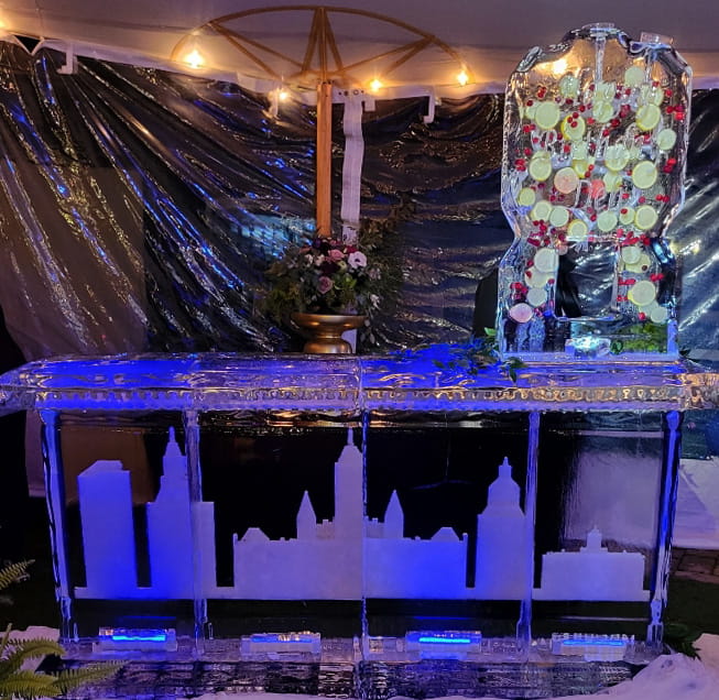 Purple illuminated event ice bar