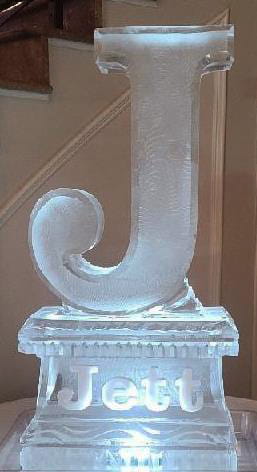 Stylized script letter J ice sculpture for a party