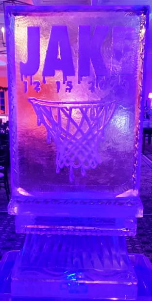 Purple illuminated basketball hoop ice sculpture