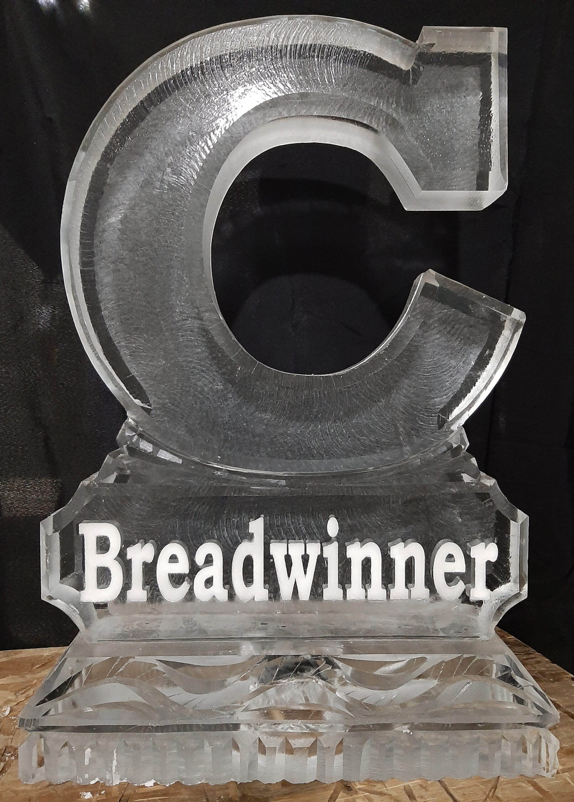 Engraved letter C ice sculpture