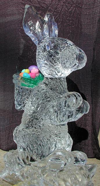 Teddy bear ice sculpture holding an Easter basket