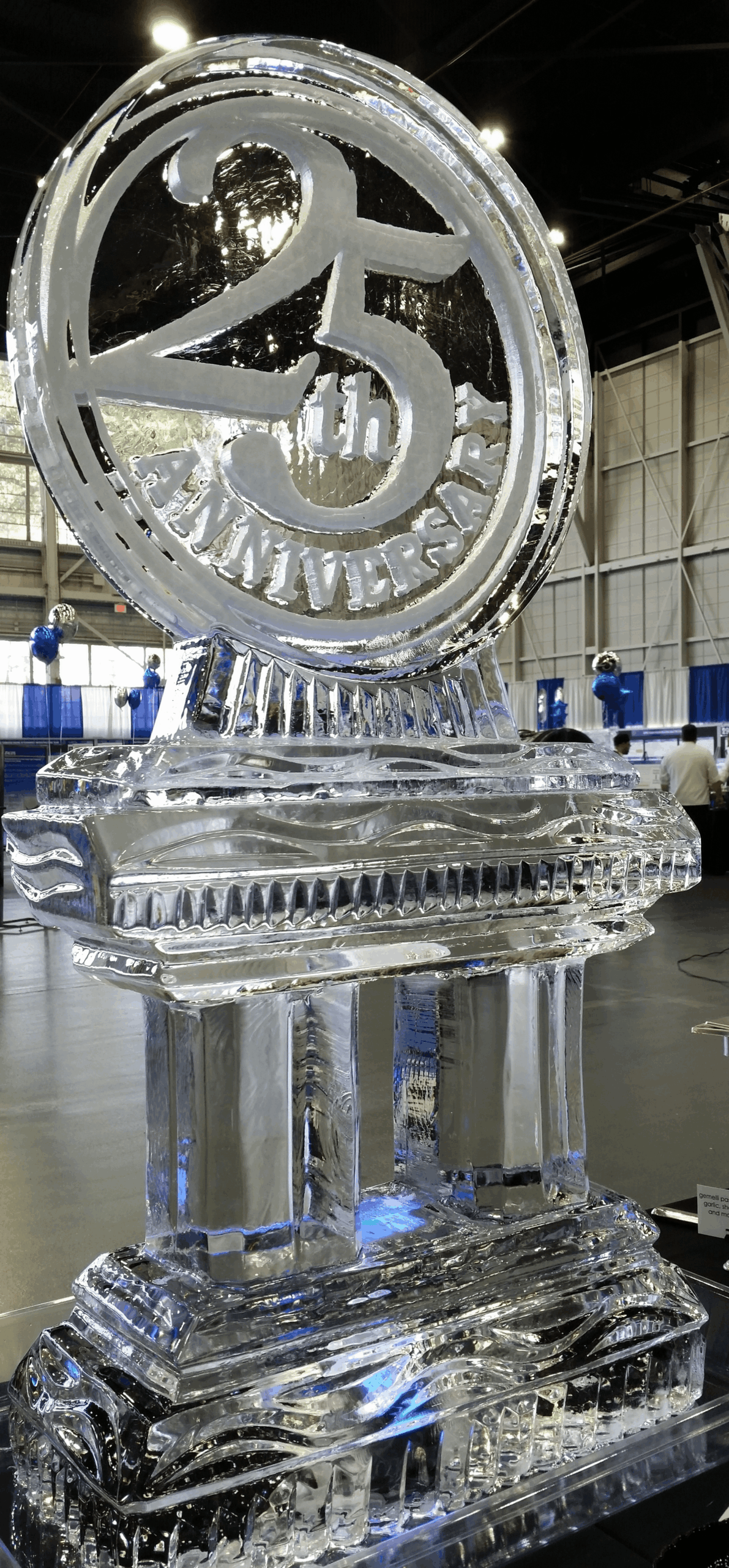 Decorative circular anniversary ice sculpture