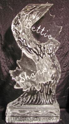 Custom engraved ice sculpture featuring script names and detailing