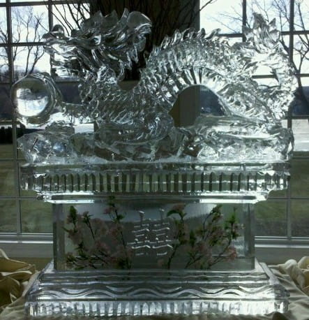 Dragon ice sculpture on decorative base