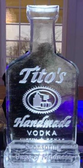 Tito's Handmade Vodka branded bottle ice sculpture with internal illumination