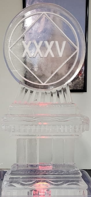 Elegant engraved anniversary ice sculpture