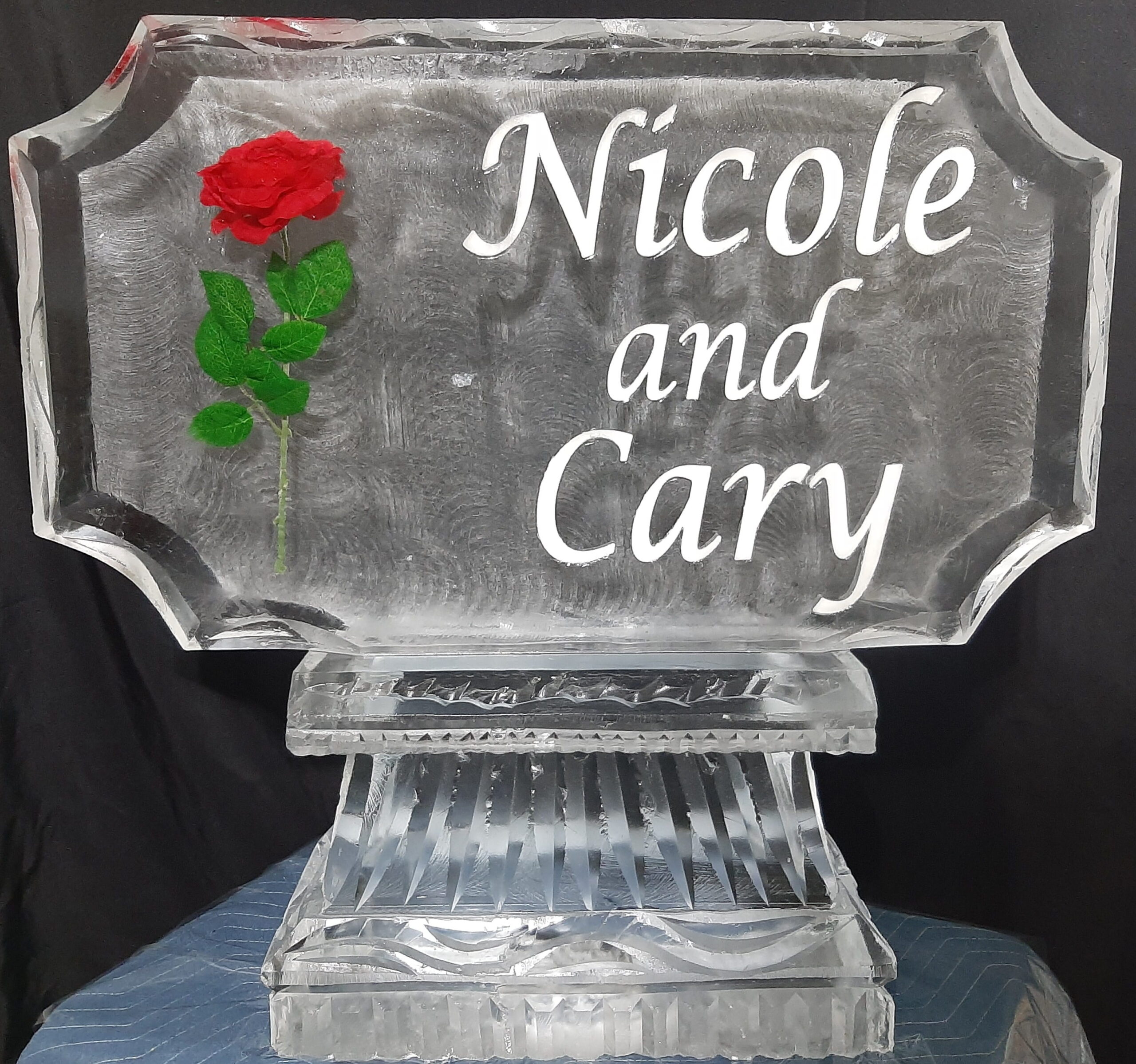 Nicole and Cary personalized rose-themed ice sculpture