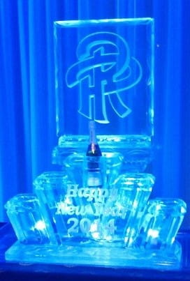 Blue illuminated custom logo ice sculpture