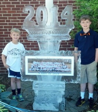 Class of 2021 graduation ice sculpture with students