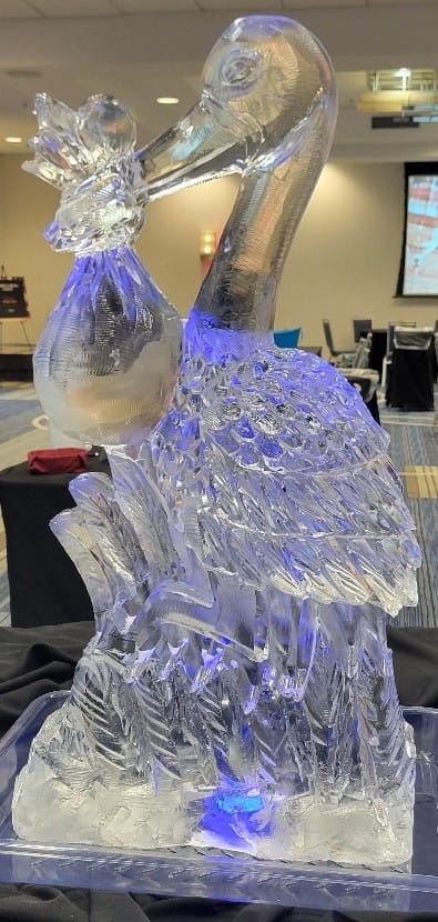 Blue illuminated bunny ice sculpture